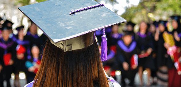 graduate wearing cap education industry