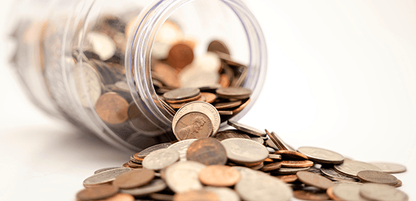 coins falling out of a jar financial service industry