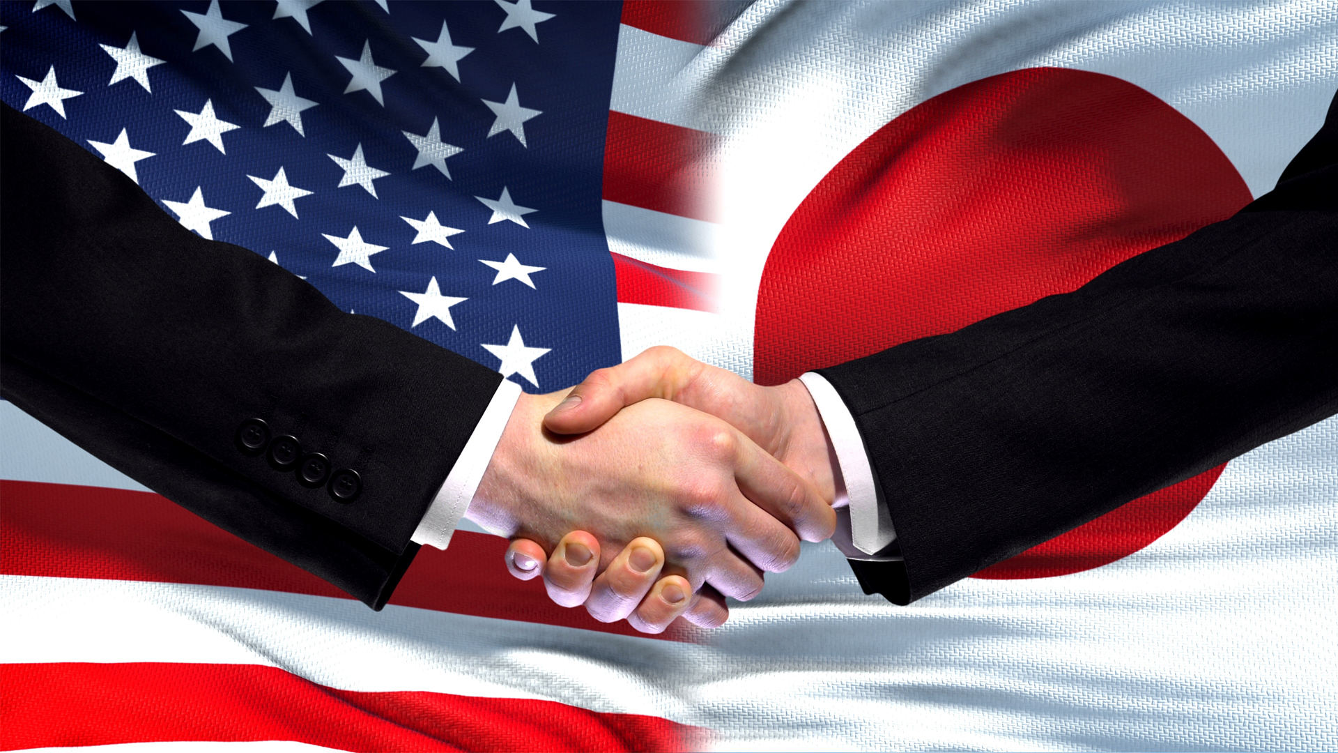 United States and Japan handshake, flag background Image