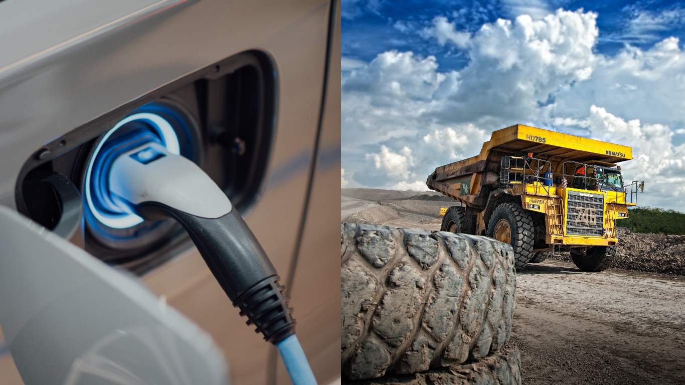 A photo of an electric vehicle being charger and a mining truck