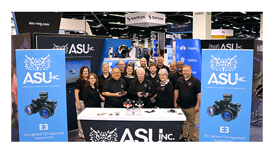 ASU Team standing together in a trade show booth