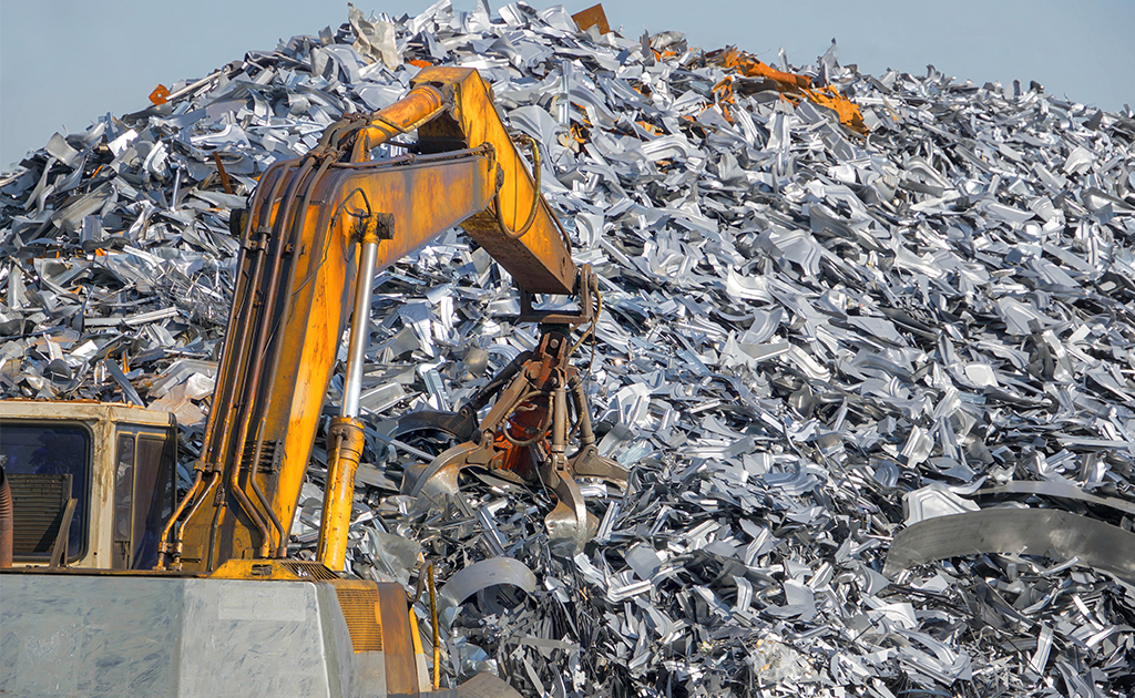 heavy equipment moving scrap metal