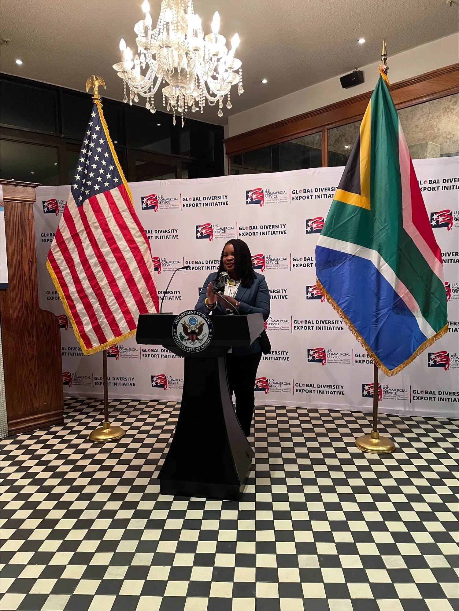 Black woman speaking at podium