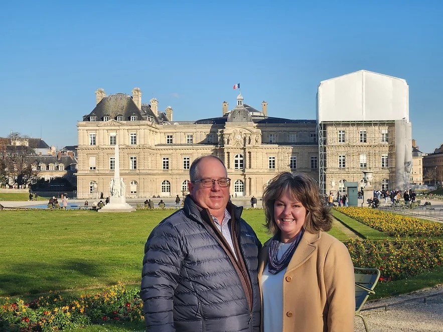 Little Plants owners standing in front of a chateau in France