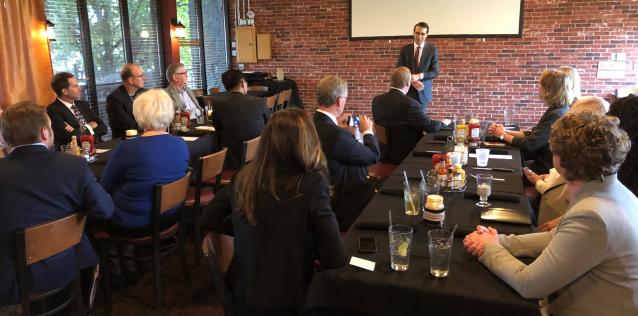 Picture of A/S Kessler speaking to seated group