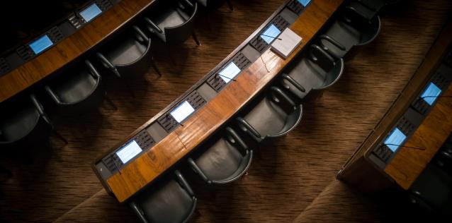 Rows of wooden chairs in congress