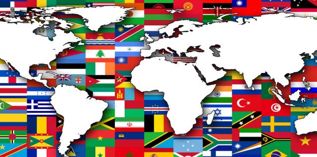 Map of the World with All Flags in Background
