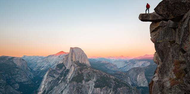 hiker at the top of Yosemite
