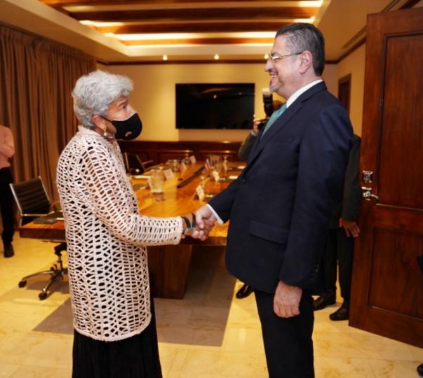 Under Secretary Lago shakes hands with Costa Rican President Rodrigo Chaves Robles.